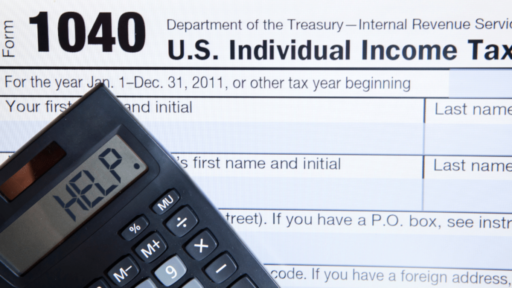 Tax form 1040 and a calculator