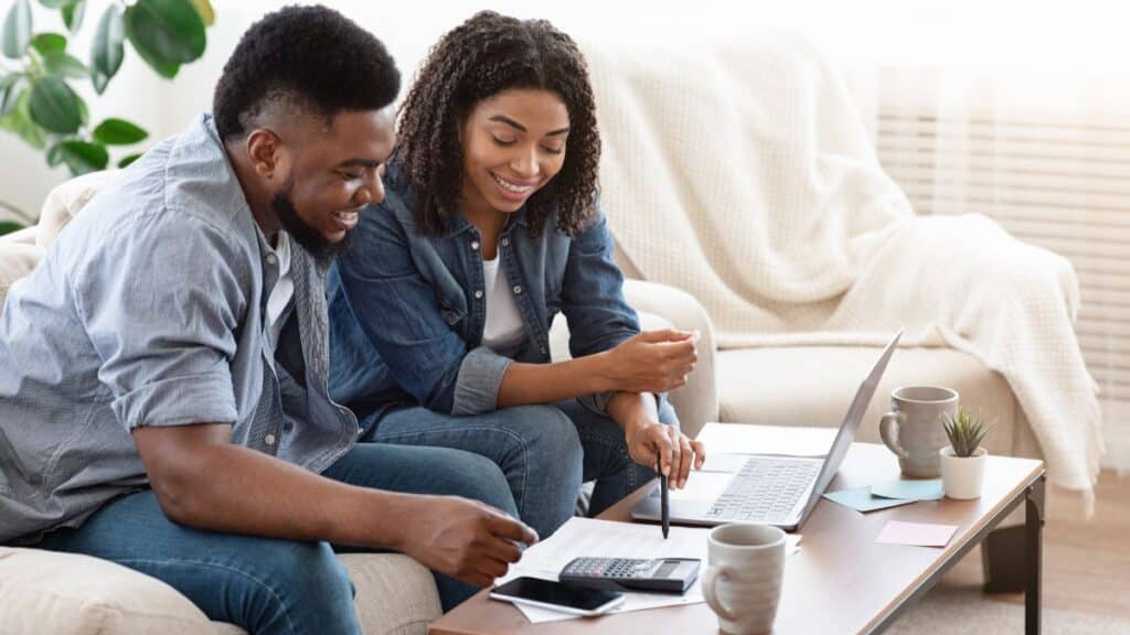 Couple budgeting their finances