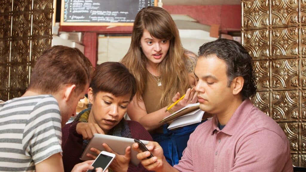 Waitress taking an order and looking annoyed