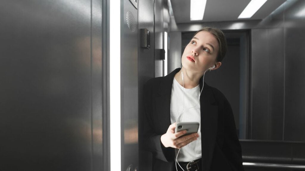 Woman waiting for an elevator