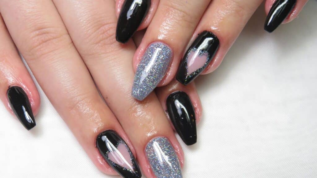 Woman's hands with fake nails on