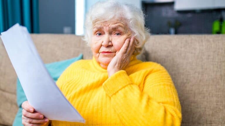 Elderly woman looking worried