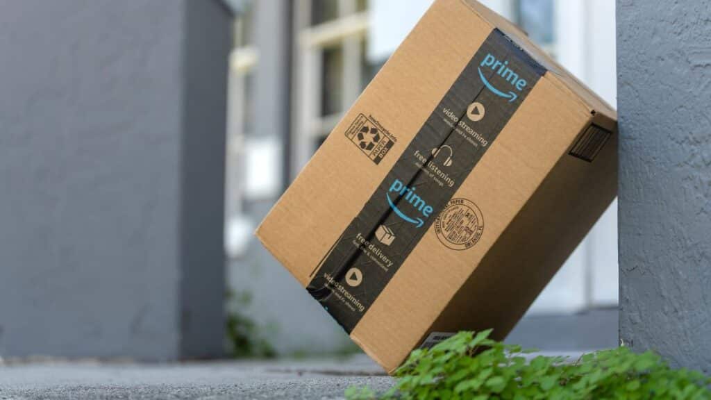 Amazon box propped up on a door