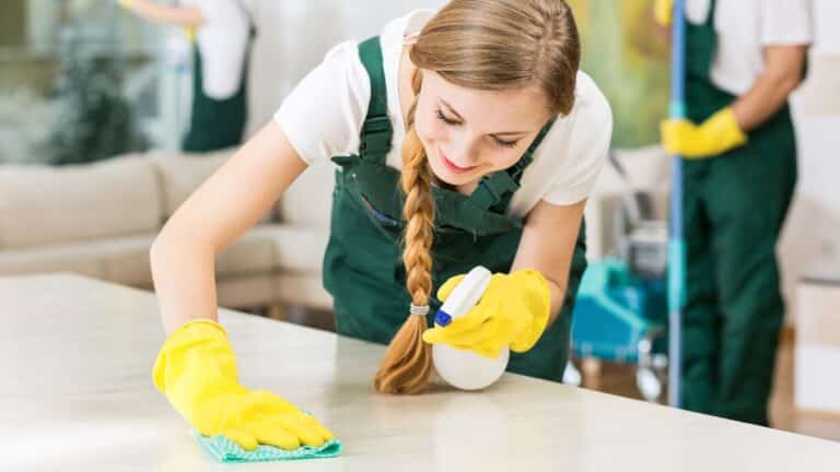 Cleaning lady scrubbing a counter
