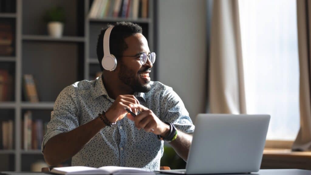 Millenial man listening to audiobook