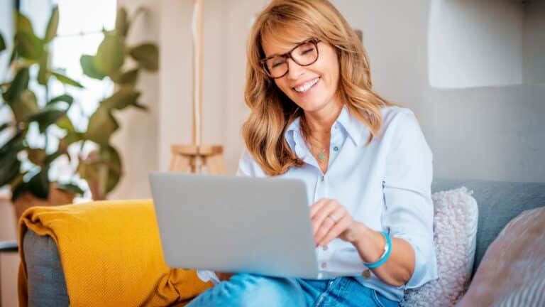 Middle-aged woman working on her laptop