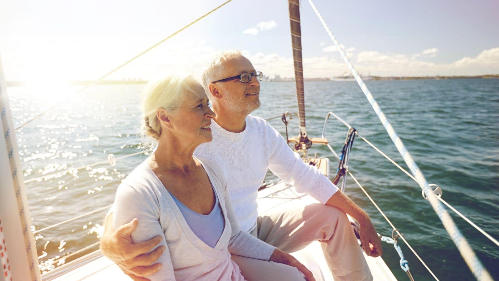 Retired couple sitting on a boat