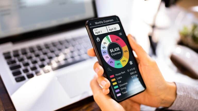 Person tracking expenses on a budgeting app