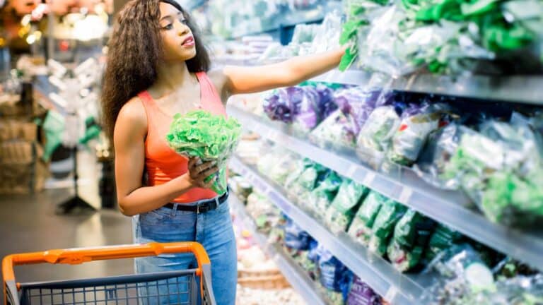 Young woman shopping in the produce aisle