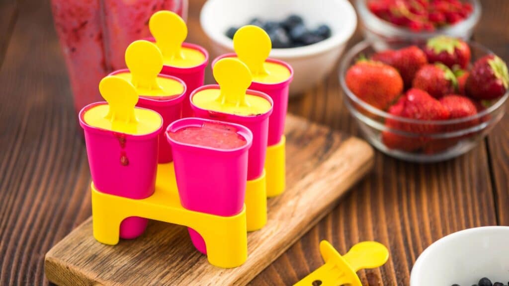 Making homemade popsicles with fresh fruit