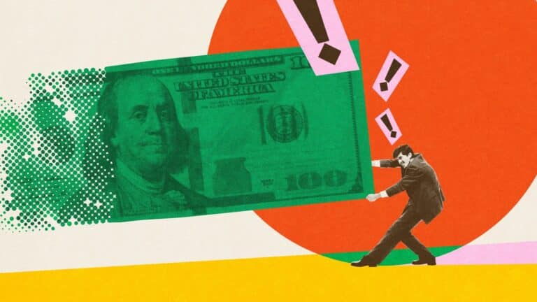 Picture of a man in a suit pushing on a large dollar bill