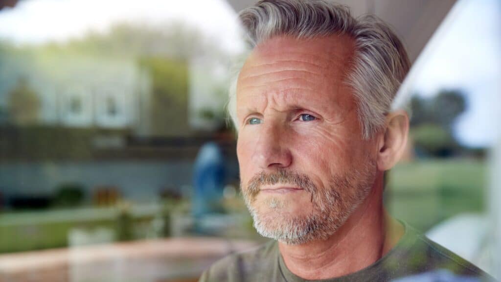 Older man looking concerned