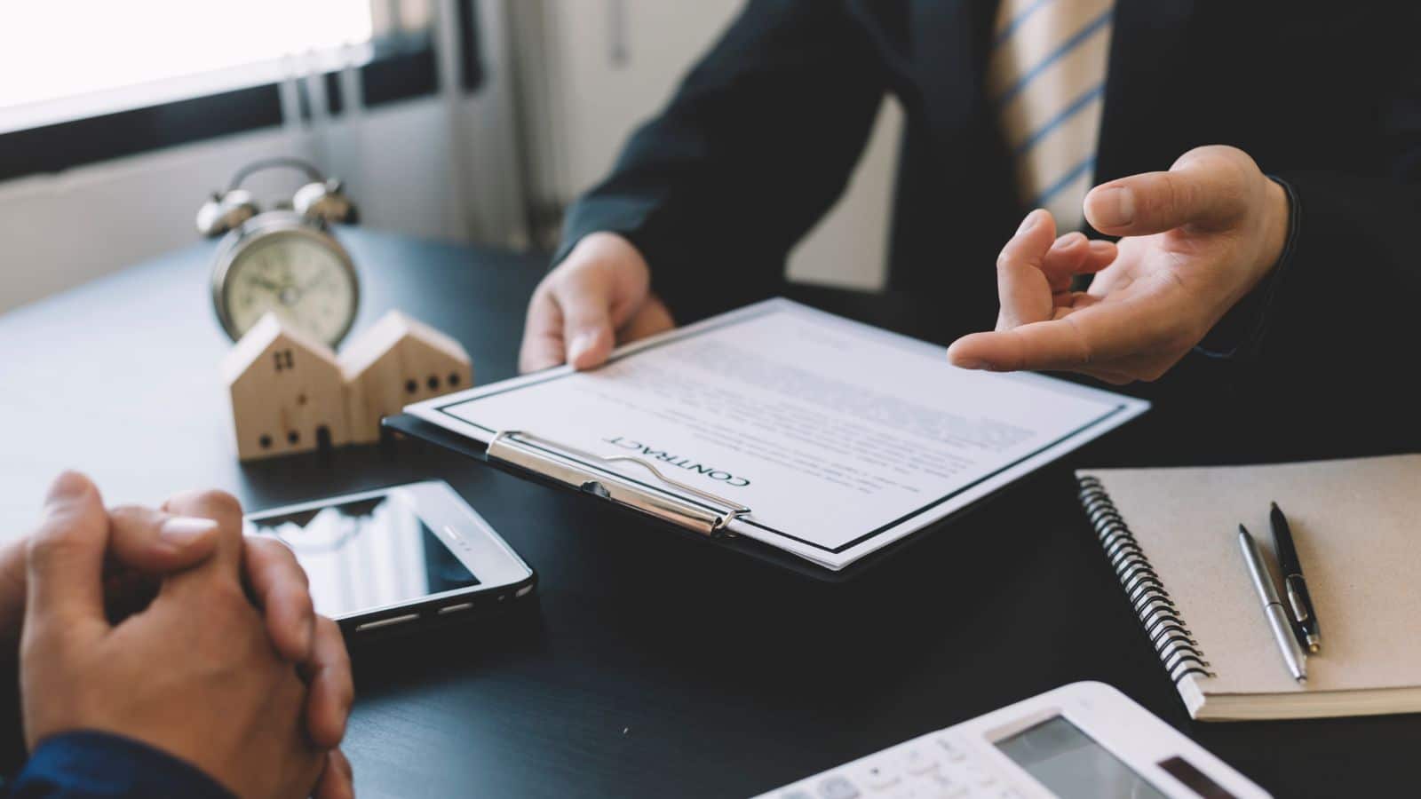 Person signing a contract