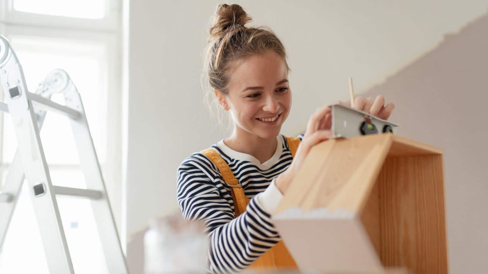 Woman working on a DIY woodworking project