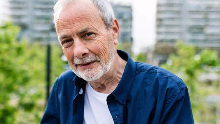 Older man looking slightly amused