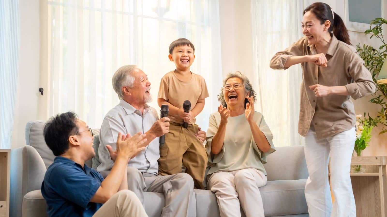 Asian family talking on the couch