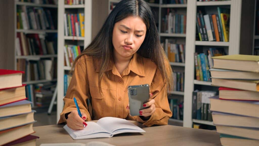 Young woman studying in a library