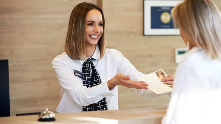 Woman checking out from her hotel