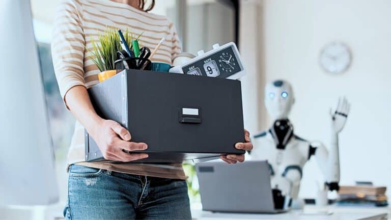 Woman being fired when a robot replaces her at work