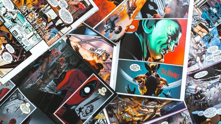 Comic book pages laying on a table