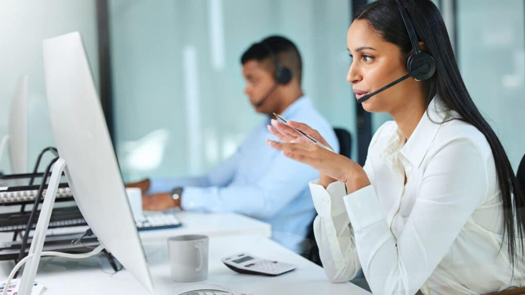 Telemarketers working in an office