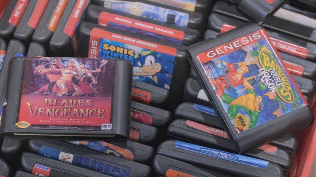 Box full of old vintage video game cartridges