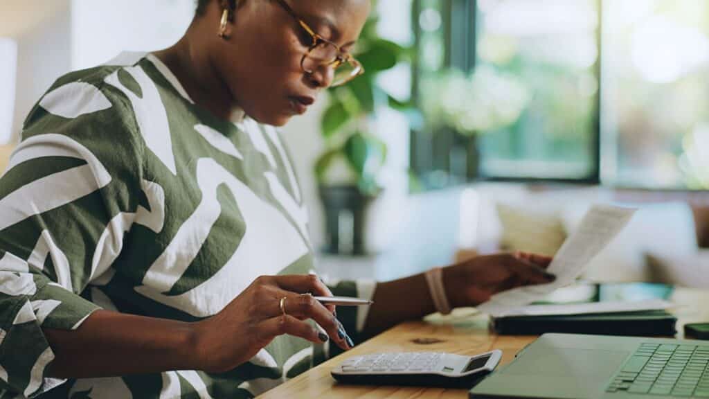 Woman completing rebate paperwork