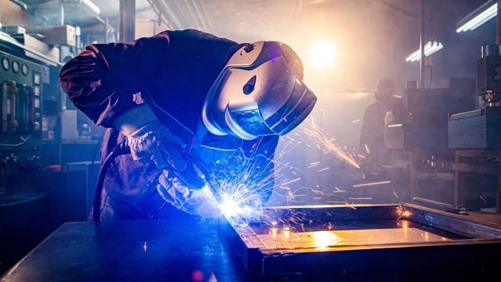 Man welding in protective gear