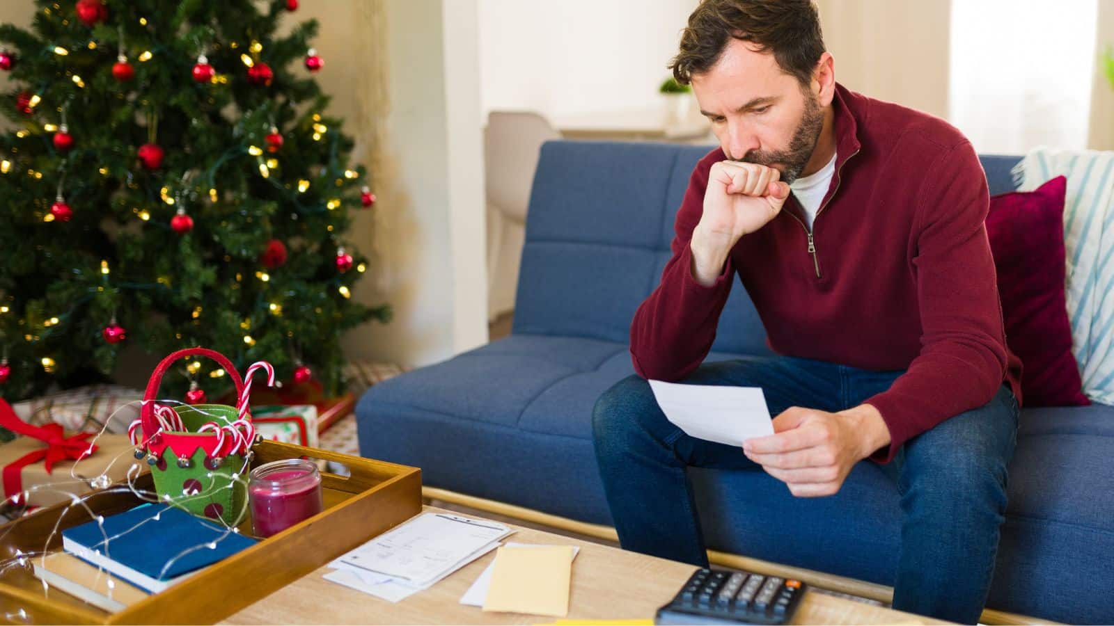 Man looking stressed about money