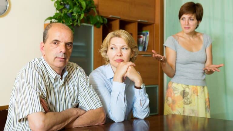 Parents arguing with their adult daughter