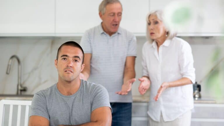 Man arguing with his older parents