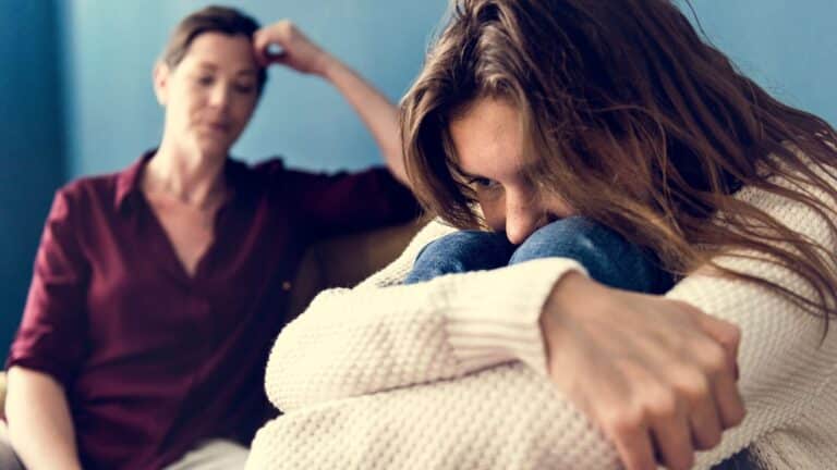 Mother and older daughter having a difficult conversation