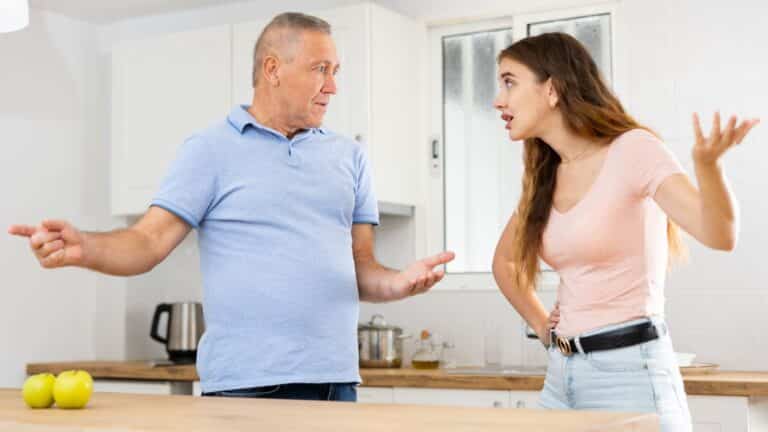 Father and teenage daughter arguing