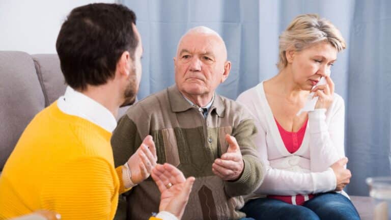 Older parents arguing with adult son