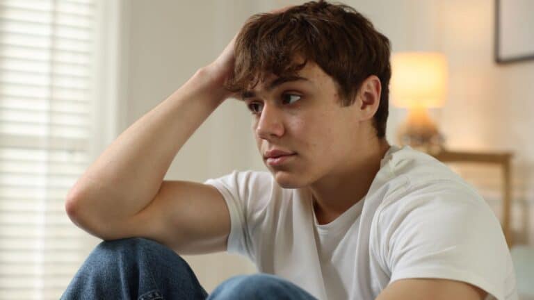 Teenage boy looking upset and worried