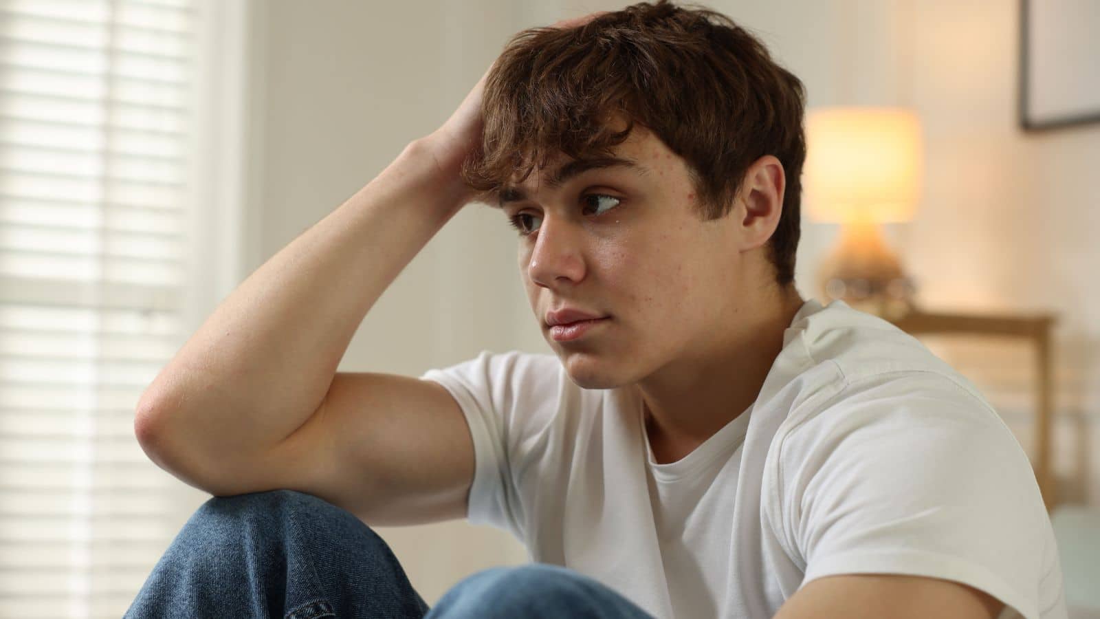 Teenage boy looking upset and worried