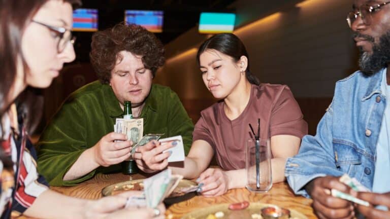Group splitting bill at a restaurant