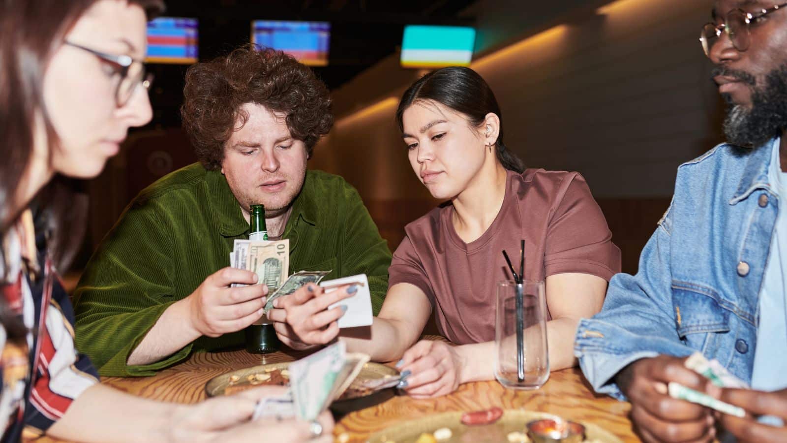 Group splitting bill at a restaurant