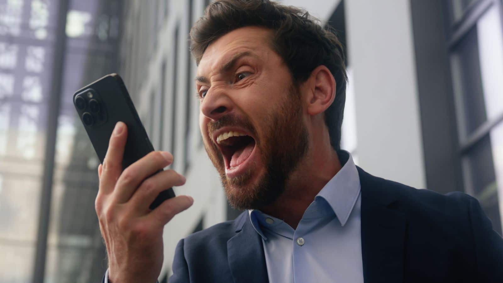Man screaming into his phone