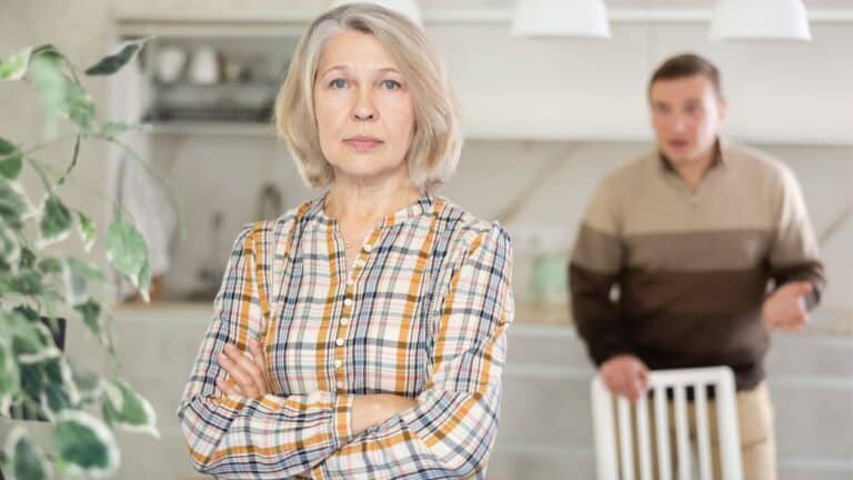 Adult son looking upset with his mother
