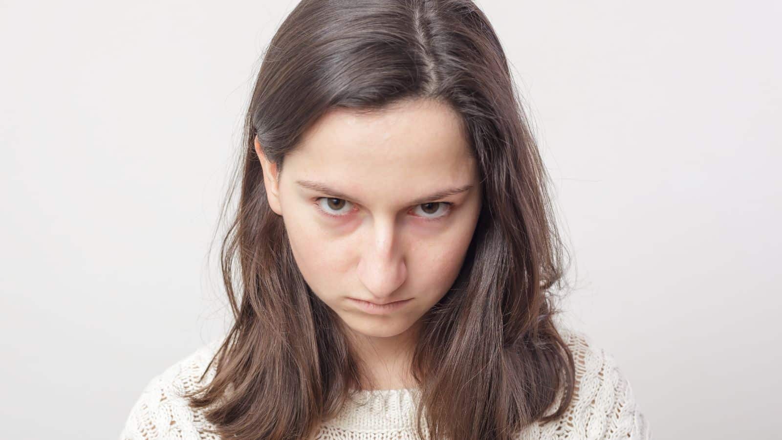 Young woman giving a weird stare