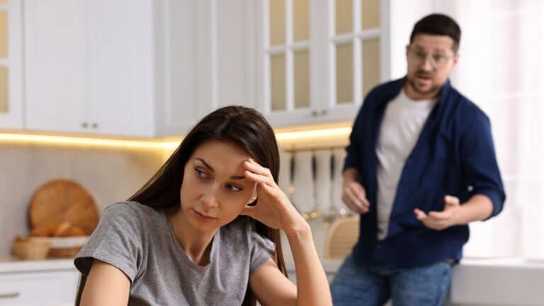 Man and woman arguing in the kitchen